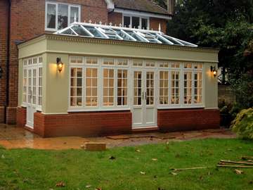 Formby , Lancashire : Building by Barlow Construction : Installation of Evolution storm windows in white wood finish : Astragal bar to Architects design : Roof covering Sarnifil : Roof light HWL 